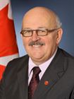 L'hon. Terry M. Mercer, D.C.L., B.A., C.F.R.E.